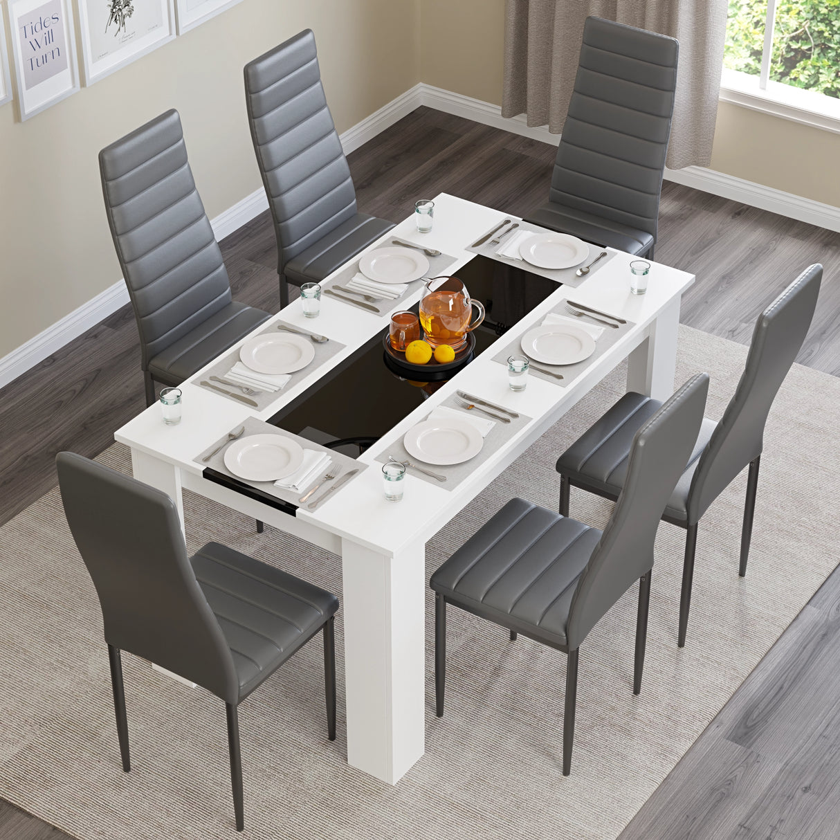 aerial view of dining table sets for 6 showing gloss white and black striped table paired with grey chairs