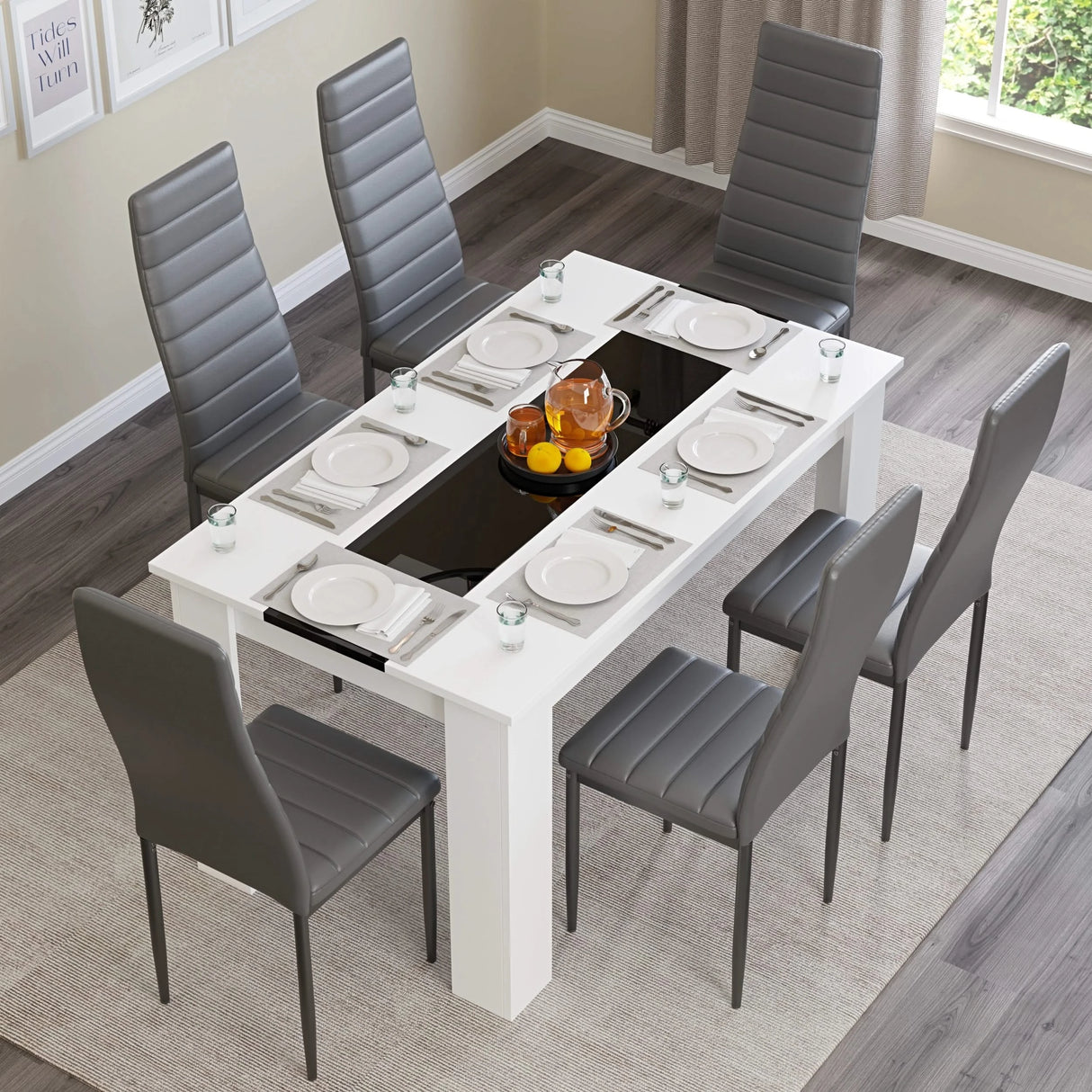 aerial view of dining table sets for 6 showing gloss white and black striped table paired with grey chairs