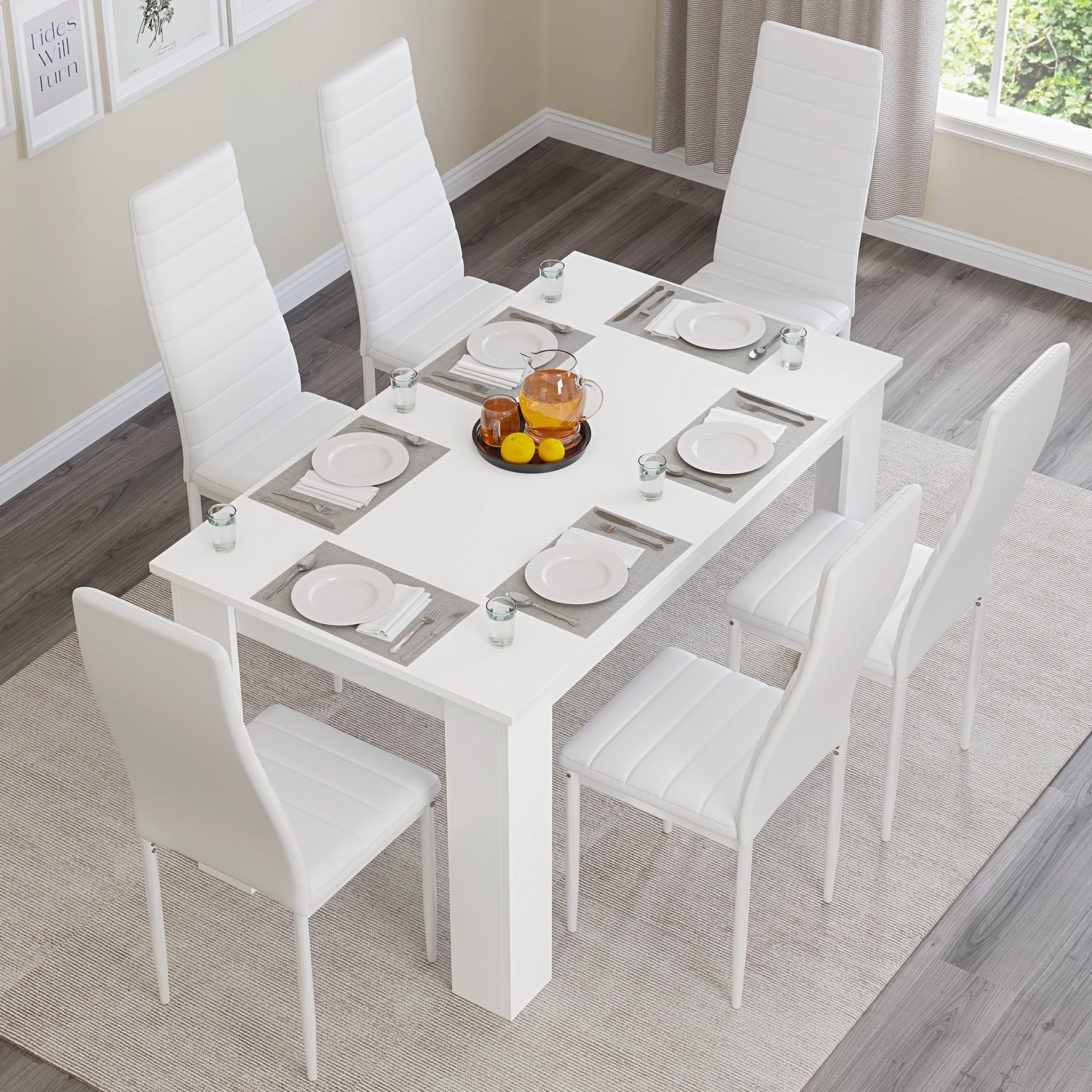 Top view of 6-seater white dining table with white chairs, set for a meal. Perfect for elegant and modern dining rooms.