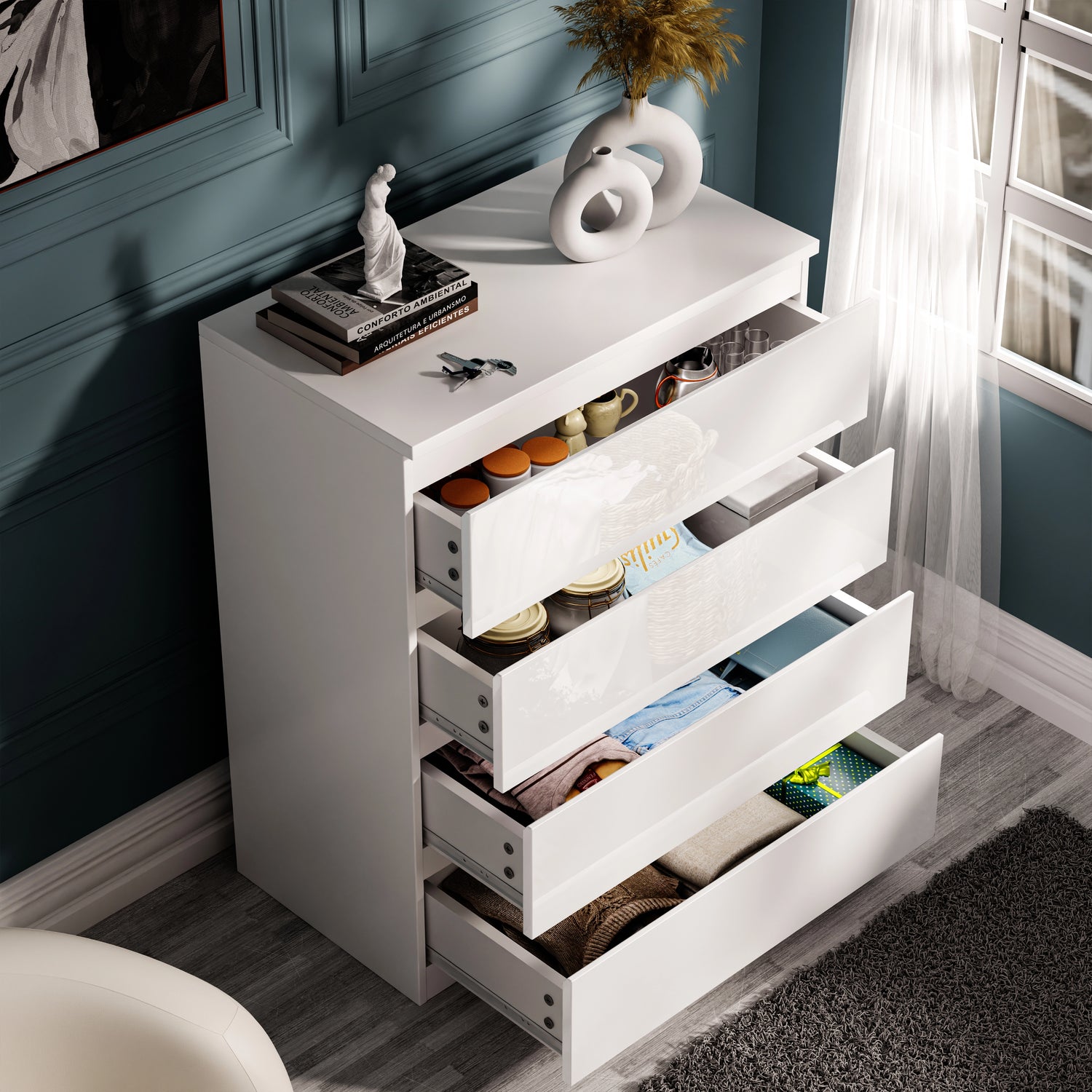 White high gloss 4 drawer chest open to reveal organized clothing, part of the 3 wardrobe bedroom furniture set.