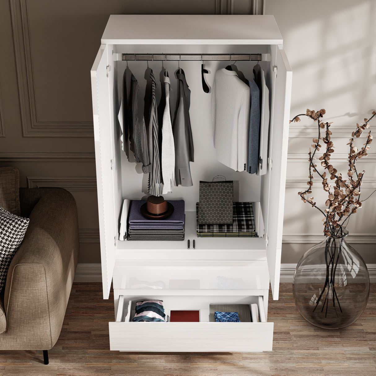 high angle shot of an open white high gloss wardrobe showing clothes on the hanging rail and folded in the bottom drawers