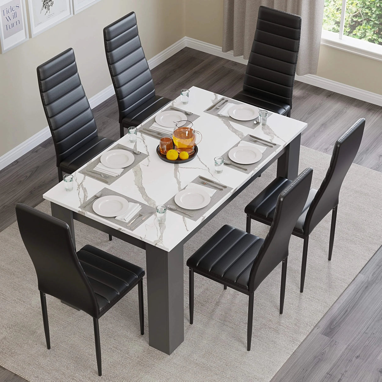 overhead view of dining table and 6 chairs featuring marble-effect top and black cushioned seating