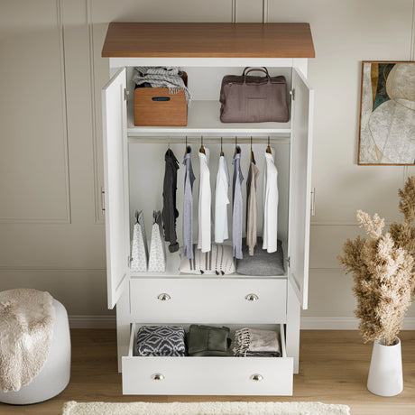 interior view of white shaker double wardrobe with drawers showing shelves, rail, and drawers from the high angle