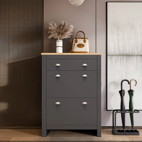 shoe cabinet hallway in grey oak finish with two pull‑down doors and top drawer, bag and decor on surface, pull‑down design