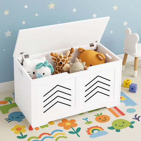 White toy box with stuffed animals on a colorful rug with star-patterned wall