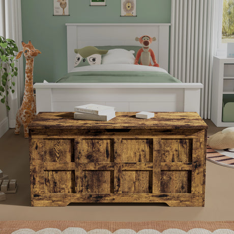 Wooden chest in a child's bedroom with a bed and stuffed animals in the background.