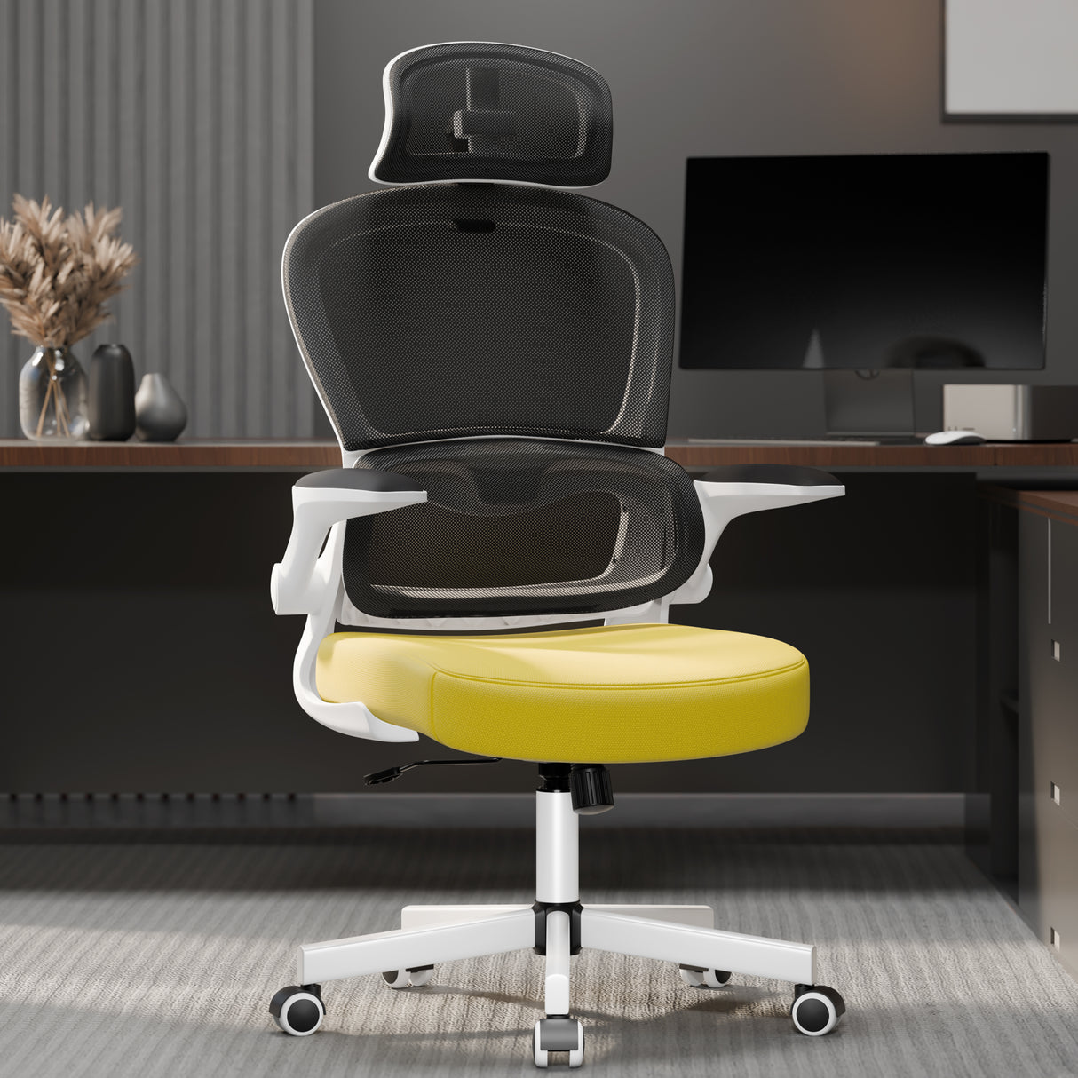 Yellow and black office chair with flip-up arms and breathable mesh for better ventilation.