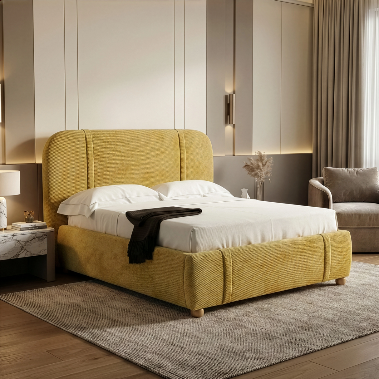 Yellow fabric king-size bed frame positioned at an angle in a softly lit bedroom