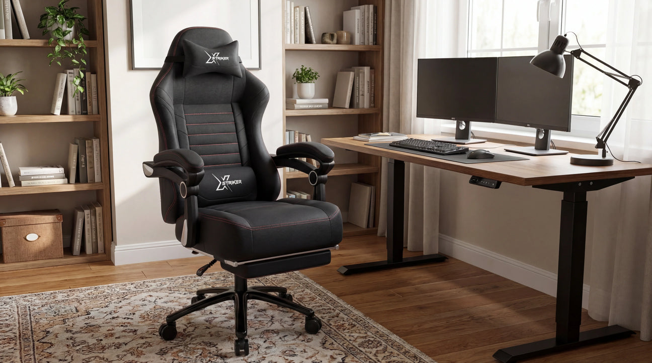 A modern gaming setup with a black ergonomic gaming chair, dual monitors, and a sleek wooden desk with a comfortable atmosphere.