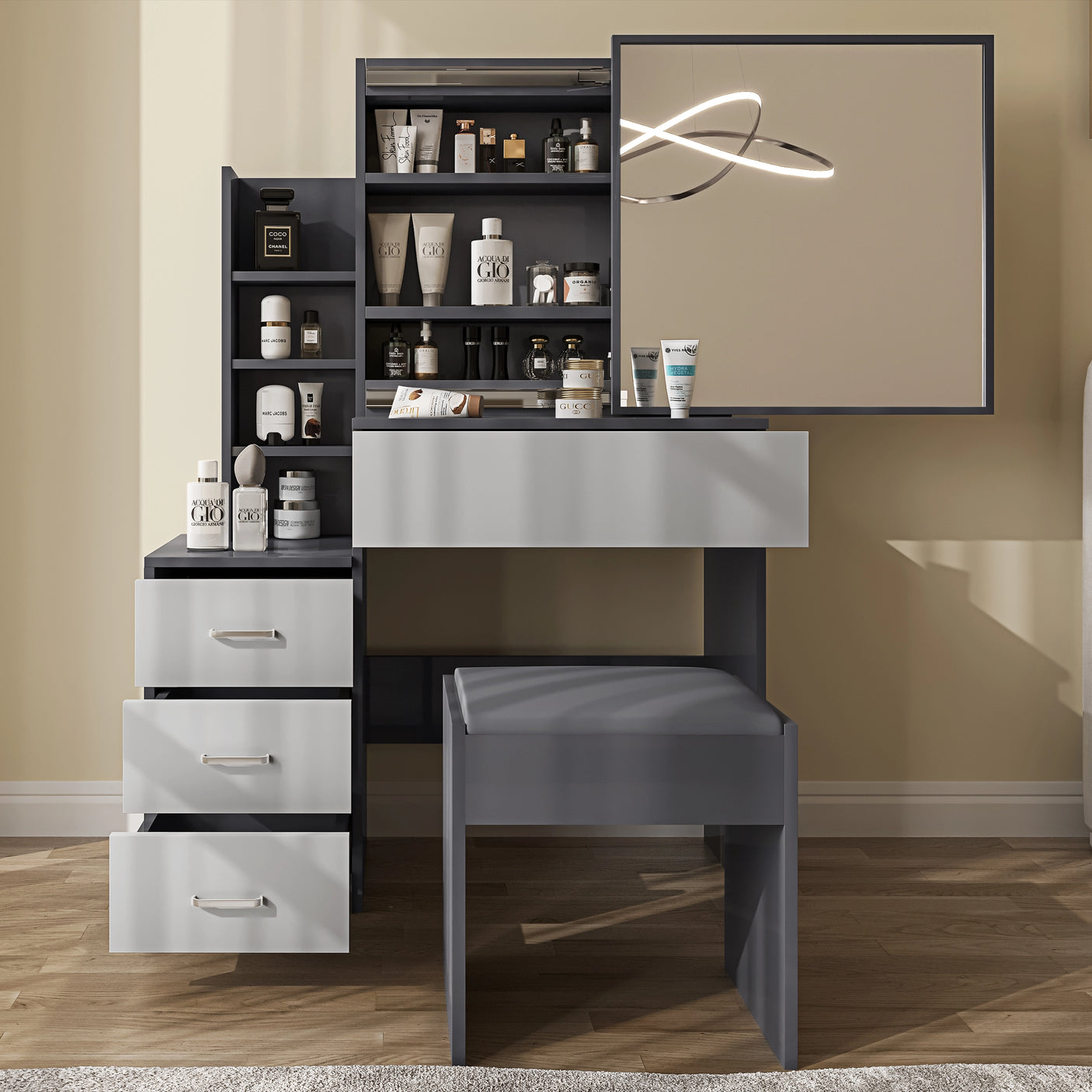 Modern grey dressing table with light grey drawers and mirror. Includes cushioned stool and organised storage for bedroom use.