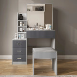Modern grey and light grey vanity makeup table with mirror and stool. Includes drawers and shelves for compact bedroom storage.