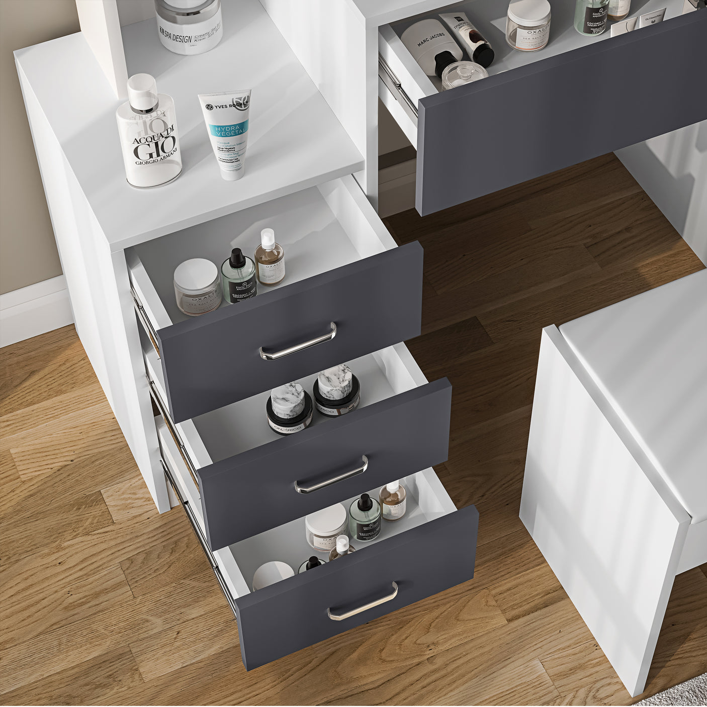 White and grey dressing table drawers open with cosmetics. Features organized storage and modern design for bedroom vanity use.