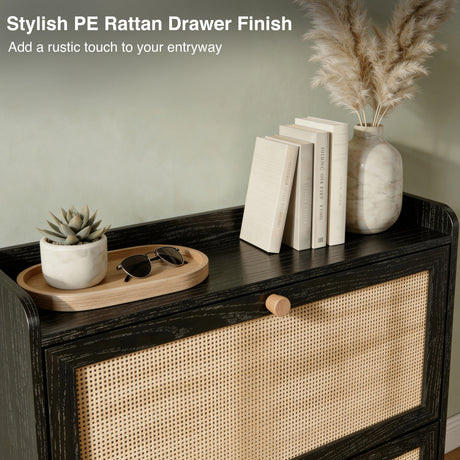[Black] Wovena shoe cabinet PE rattan drawer panel close-up with styled top surface showing marble vase, succulent, sunglasses tray, and books against sage wall