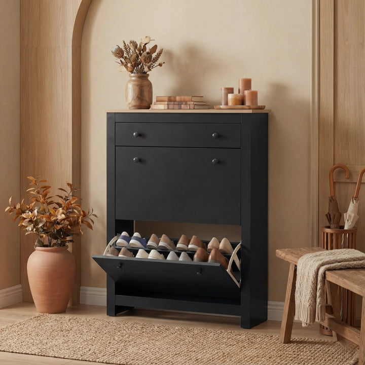 [Black] Black shoe cabinet styled in arched alcove with lower flip-down door open exposing pale shoes
