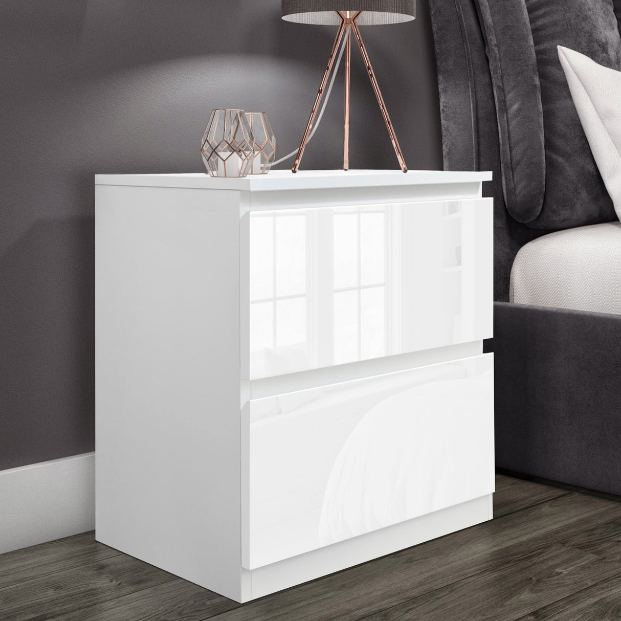 Elegant 2-drawer white bedside table for organized and sleek bedroom storage.