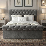 Chesterfield Ottoman Storage Bed in grey velvet with side lift mechanism, tufted headboard and footboard, ideal for hidden bedroom storage.