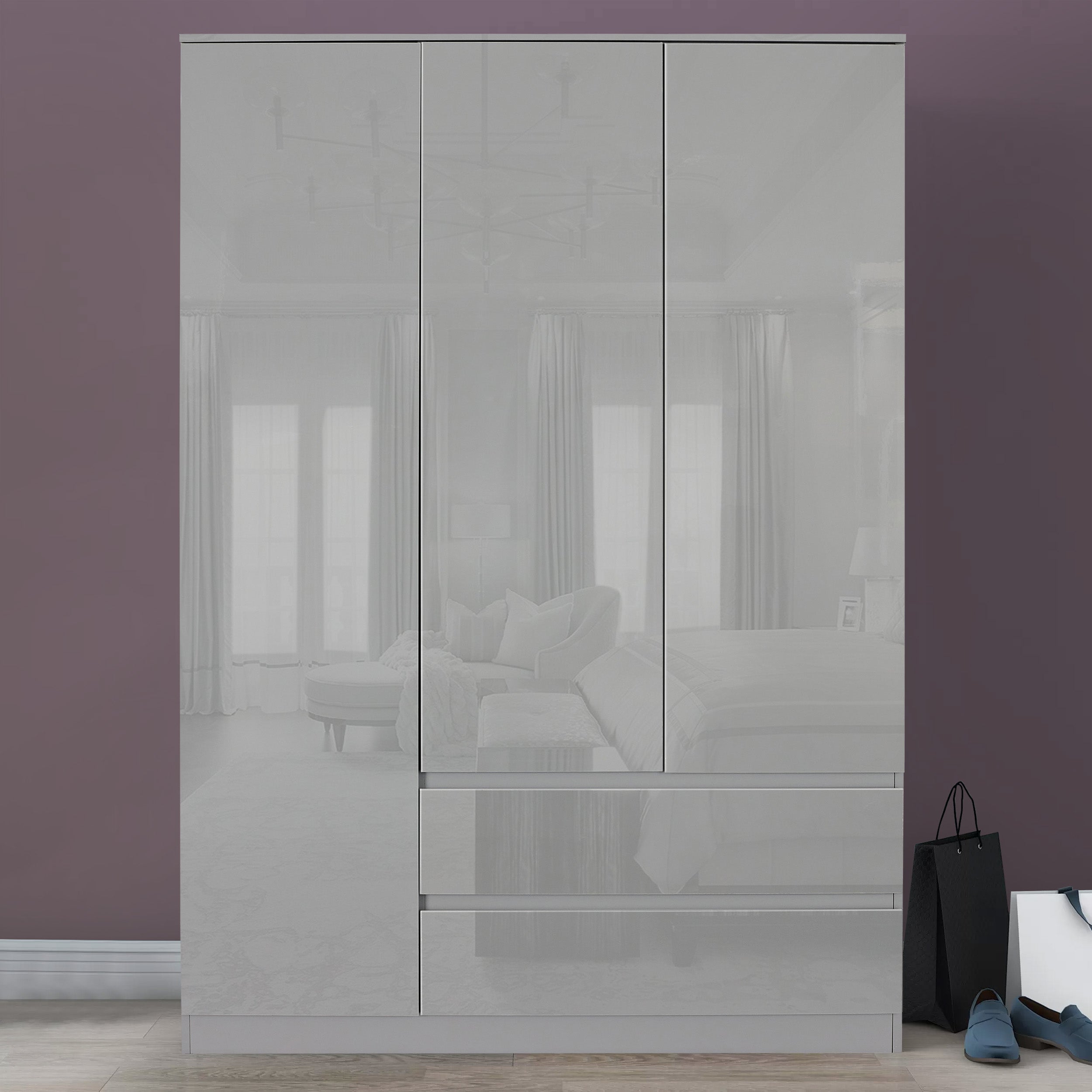 Grey 3-door wardrobe and drawers set, modern design with ample storage space.