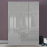 Grey 3-door wardrobe and drawers set, modern design with ample storage space.