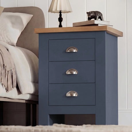[Blue] Side angle of shaker nightstand showing solid construction and oak top with decorative items