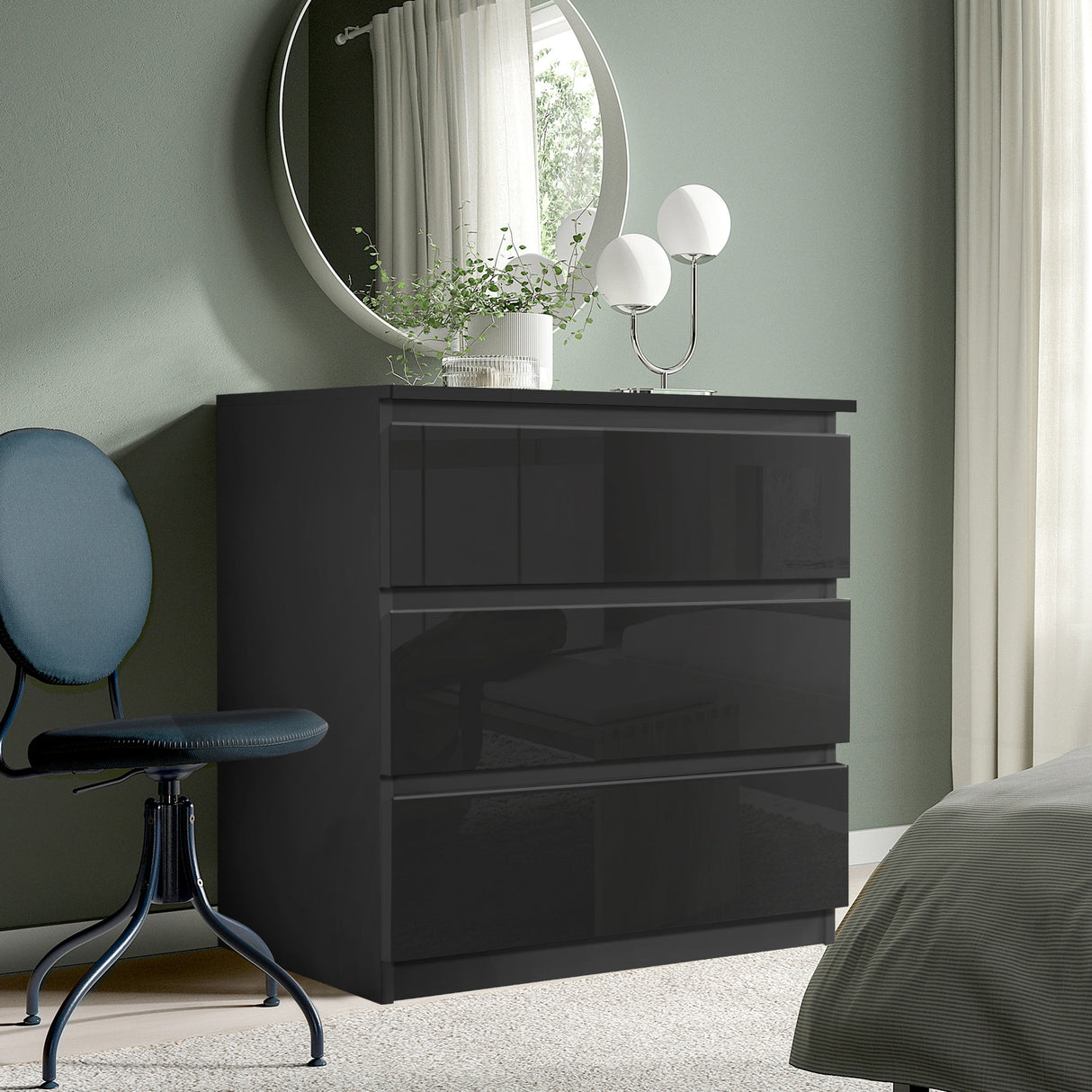 Black 3-drawer chest, stylish and practical for modern bedroom storage.