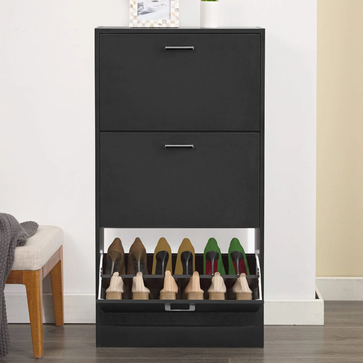 [Black] Tall black shoe cabinet on light floor, two upper drawers closed and lowest drawer dropped forward