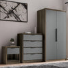 Skova 3 Piece Bedroom Set with 2-door wardrobe, 4-drawer chest, and 1-drawer bedside table in grey and oak finish, ideal for modern UK bedrooms.