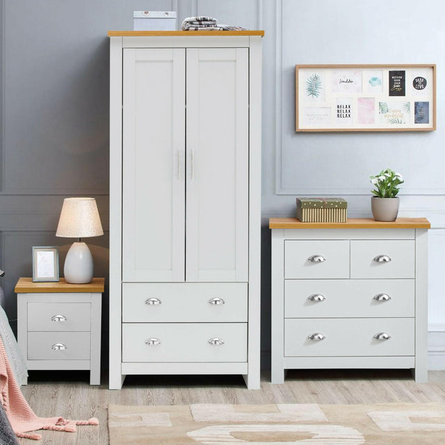 3 piece wardrobe set in white with wooden tops, featuring a wardrobe, chest of drawers.