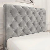 Detailed view of light grey tufted headboard with Chesterfield design, featuring soft velvet fabric and deep button accents.