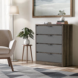 Grey finish 4 chester drawers with four drawers, placed in a modern room with decorative items on top