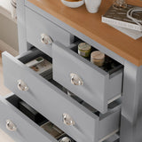 2 over 2 chest of drawers bedroom unit in grey with wood top, featuring four spacious drawers with silver cup handles, ideal for compact storage.