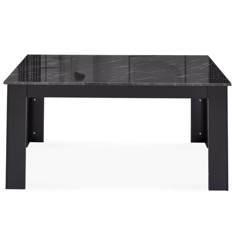 4-seater dining table black color sleek and stylish design for modern dining spaces.