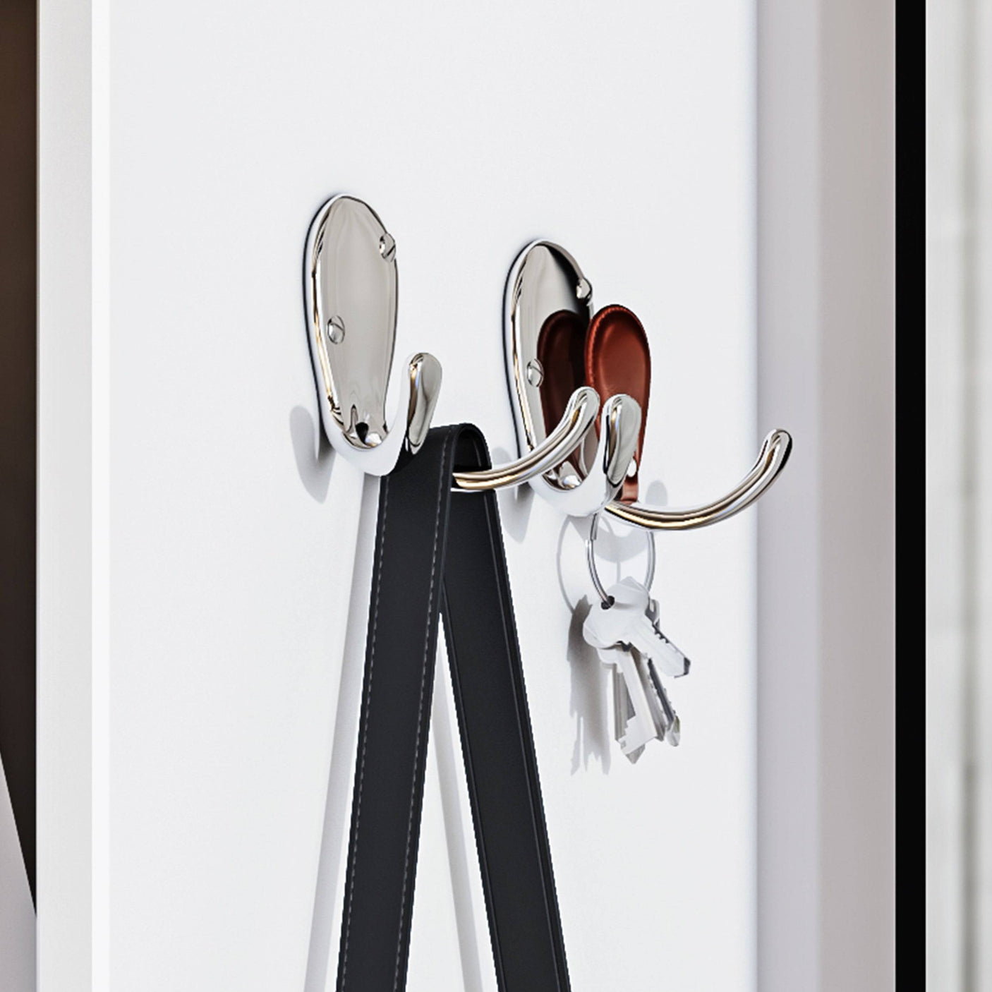 Close-up of chrome hooks on the side of Blisswood Shoe Cabinet Hallway for hanging keys and bags. Functional hallway storage solution.