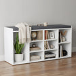 White bookshelf with gray top shelf against a plain wall