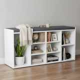 White bookshelf with gray top shelf against a plain wall