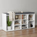 White bookshelf with gray top shelf against a plain wall