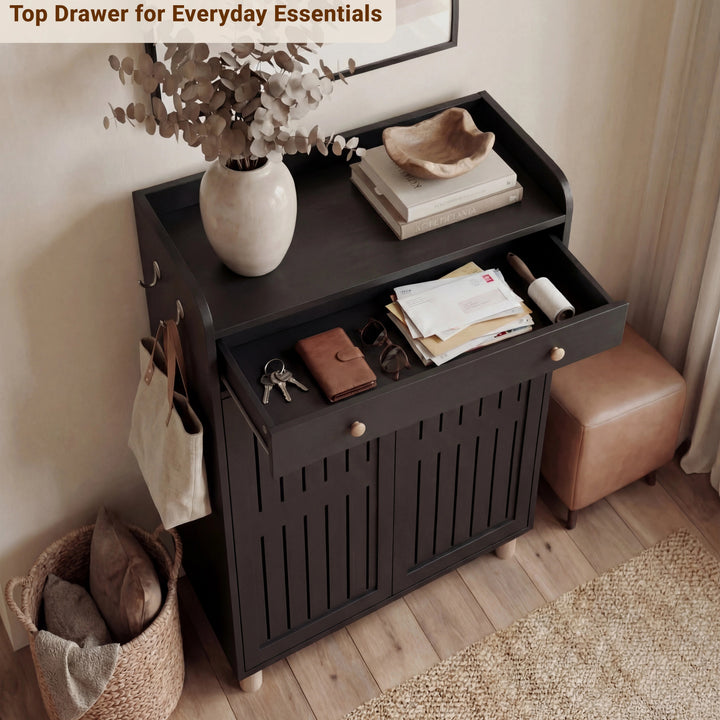 [Black] Top drawer of 5 tier shoe cabinet pulled open showing stacked books, notebooks and a leather pouch inside