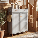 [Grey] 5-tier shoe cabinet with both slatted doors closed styled in hallway beside staircase