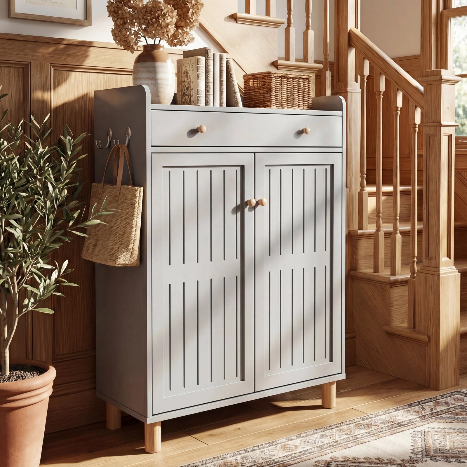 [Grey] 5-tier shoe cabinet with both slatted doors closed styled in hallway beside staircase