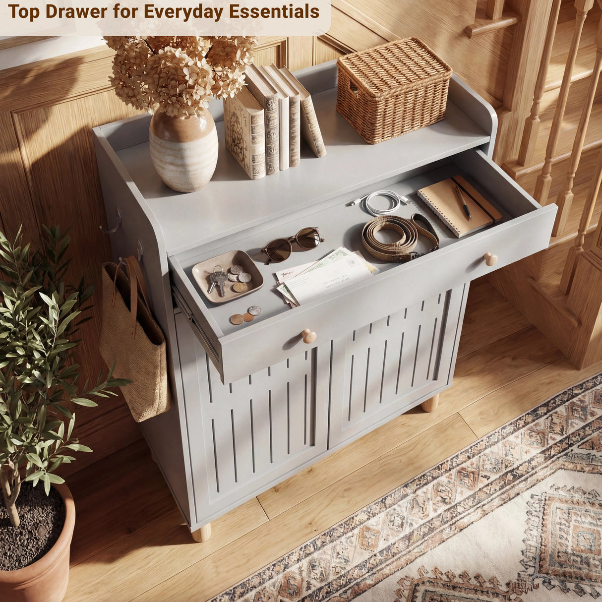 [Grey] Top utility drawer open from above revealing organised small items with text overlay