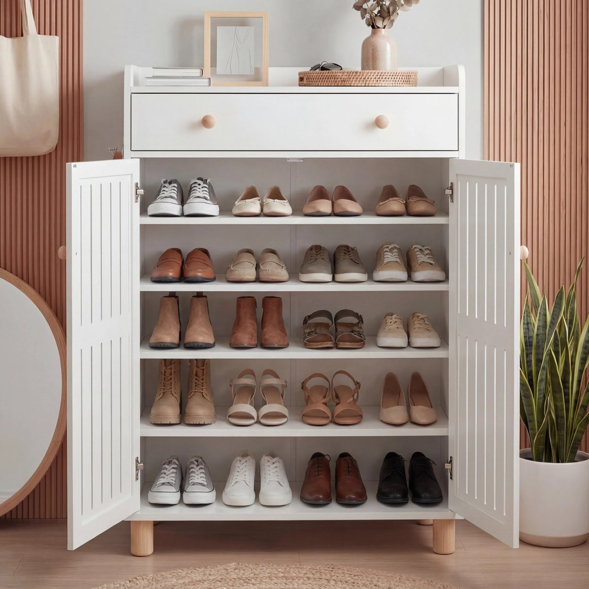 [White] Shoe cabinet fully open showing over 20 pairs organised on five shelf tiers from floor to top