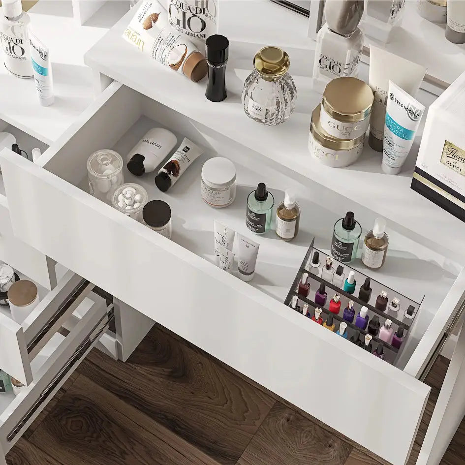 White dressing table drawer open with cosmetics and nail polish. Features organized storage and modern design for bedroom vanity use.
