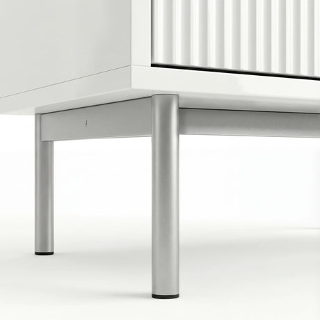 [White] six chest of drawers with silver metallic legs close detailing on a white background