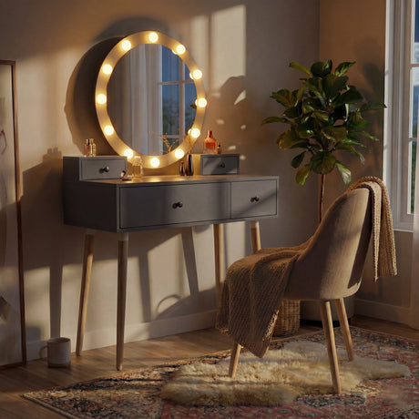 Dressing Table With Drawers and Hollywood Mirror Makeup Vanity Desk in black with warm LED lights, wooden legs, and matching chair in cozy bedroom setting