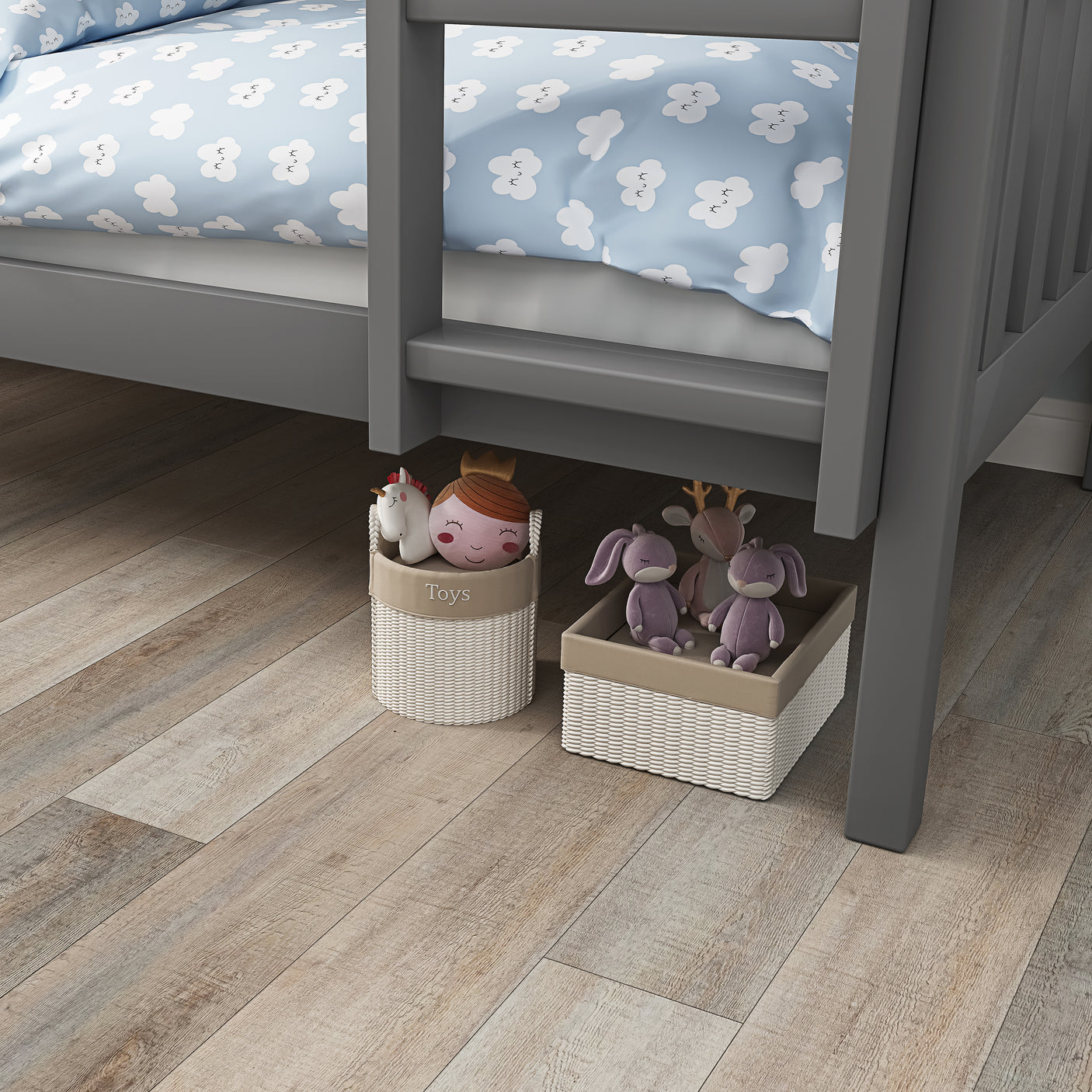 Under-bed storage space of dark grey bunk bed with toy baskets, ideal for maximizing space in kids' bedrooms.
