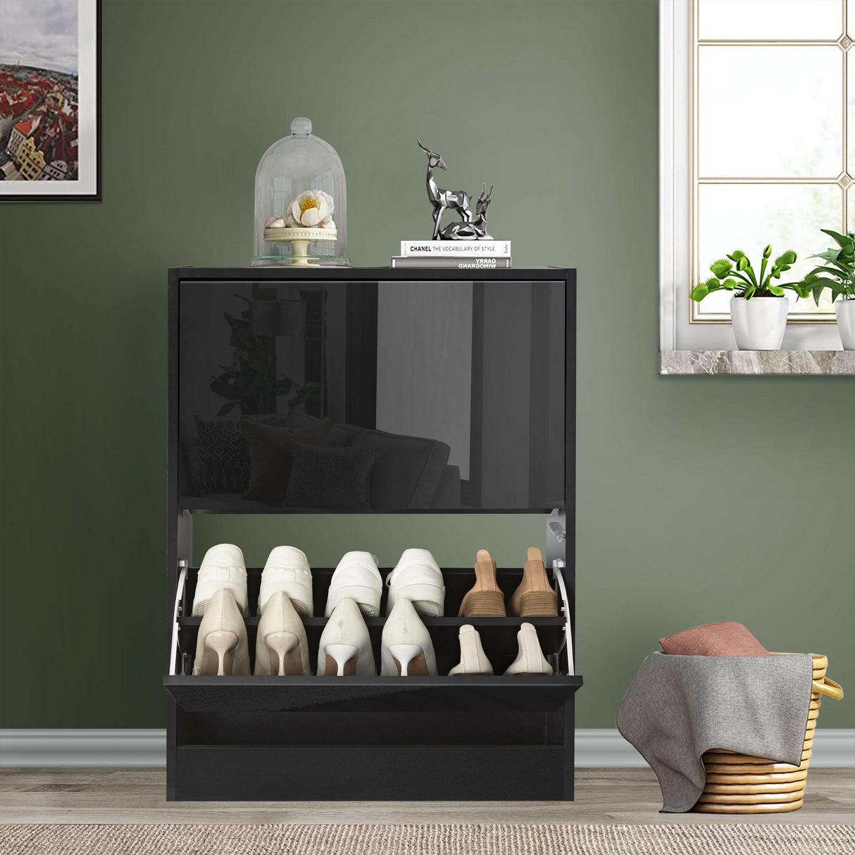 Black shoe storage cabinet with sleek design and multiple shoe compartments