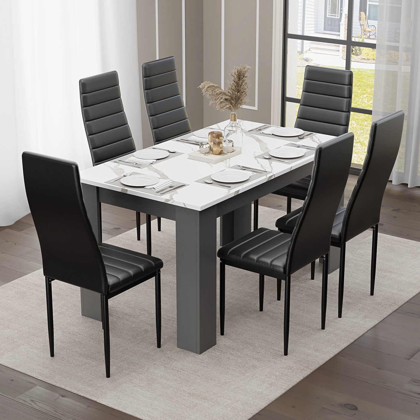 6 seater dining table with black padded chairs and grey marble-effect tabletop, ideal for modern dining rooms.
