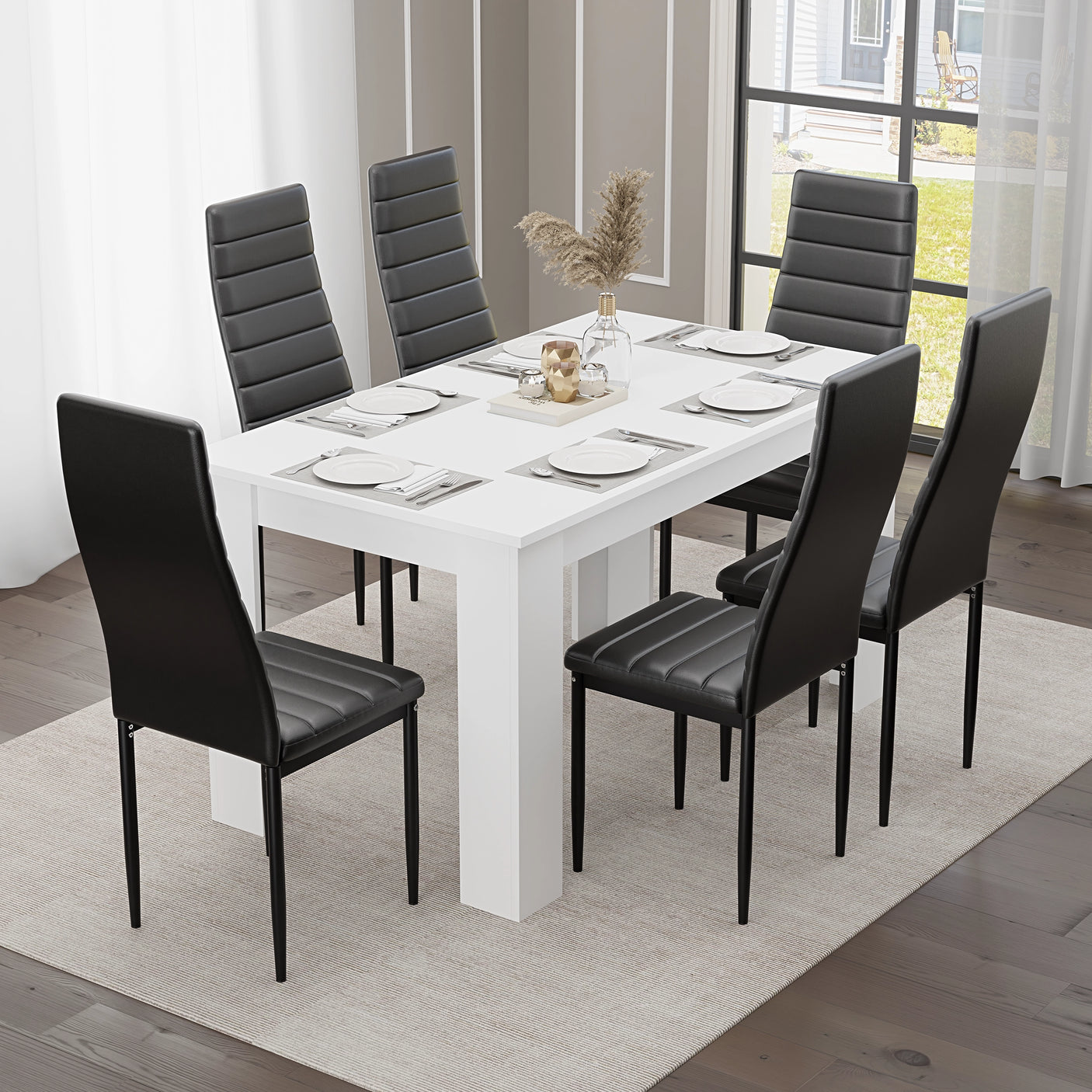 Dining table set 6 seater – Sleek white table with six black padded PU leather chairs, ideal for modern kitchen or dining room interiors.