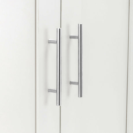 Close-up of the silver metal handles on a white wardrobe, showcasing a modern design.