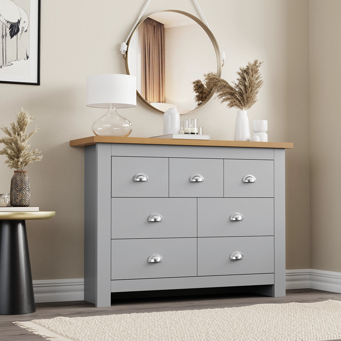 7 Drawer Wide Chest of Drawers in grey with oak top, ideal large bedroom dresser for clothes and accessories storage. Features silver cup handles.