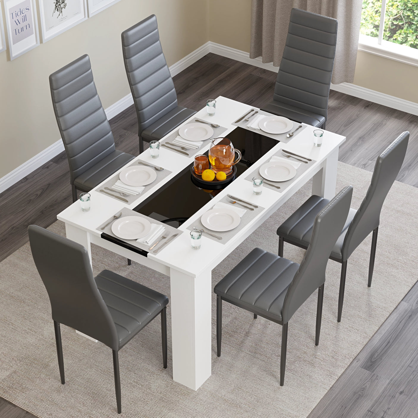 Stylish 6 seater dining table with grey chairs and white table, set for a meal in a contemporary dining space.